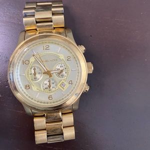 MK gold color watch